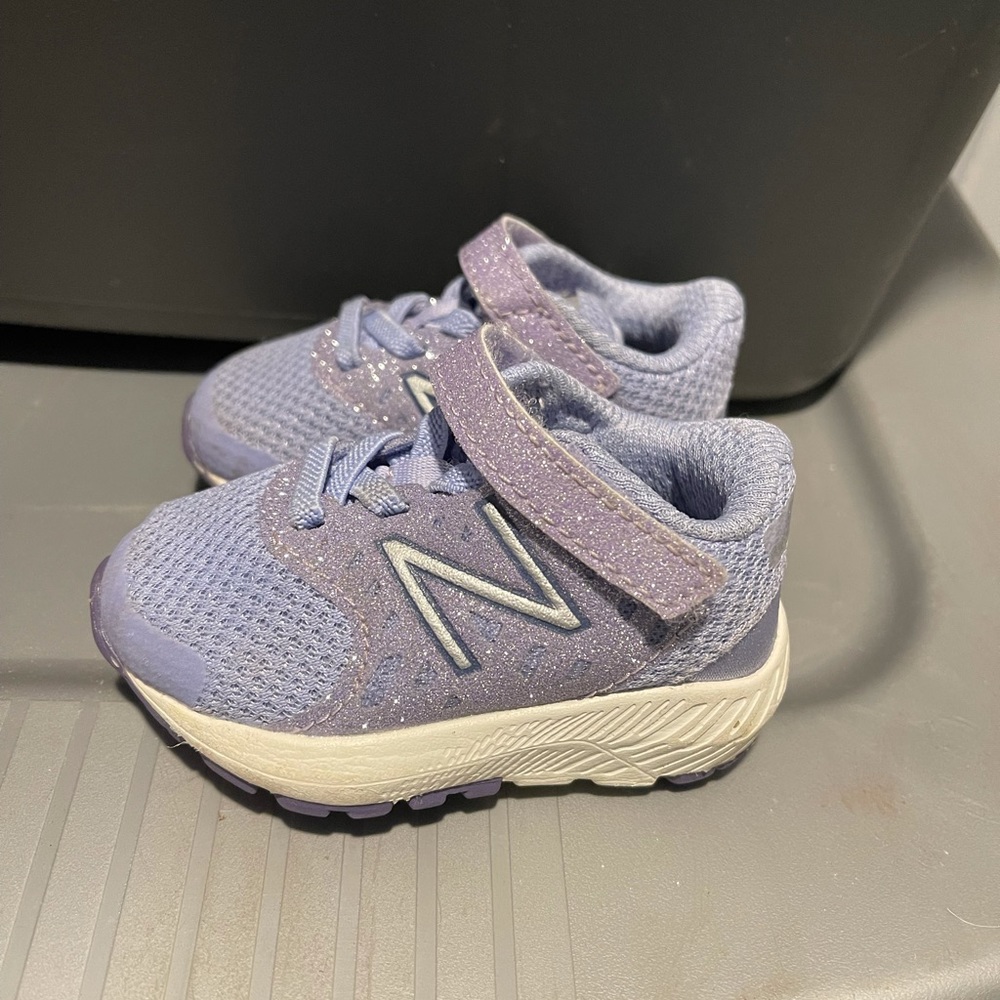 New balance size 2 WIDE. Purple sparkly infant sneakers.